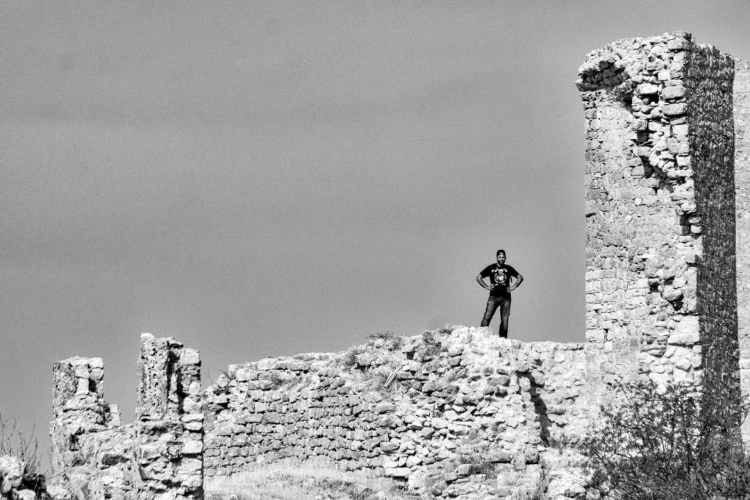 A Dark Clad Figure Upon the Castle Wall