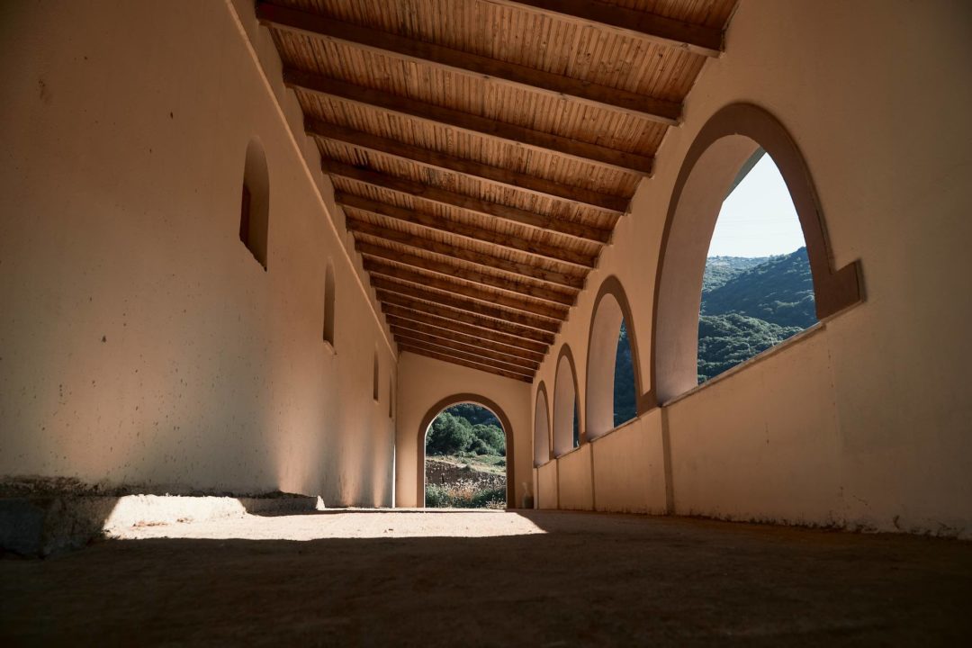 A covered walkway in the side of a church